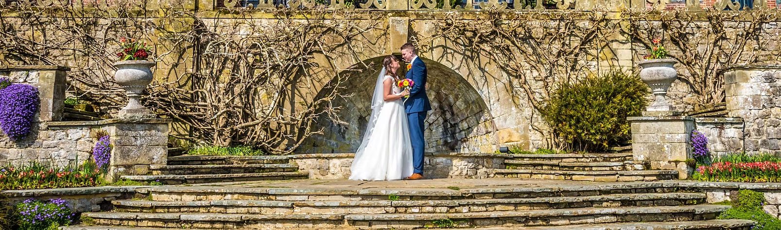 Bride and groom on embrace on steps