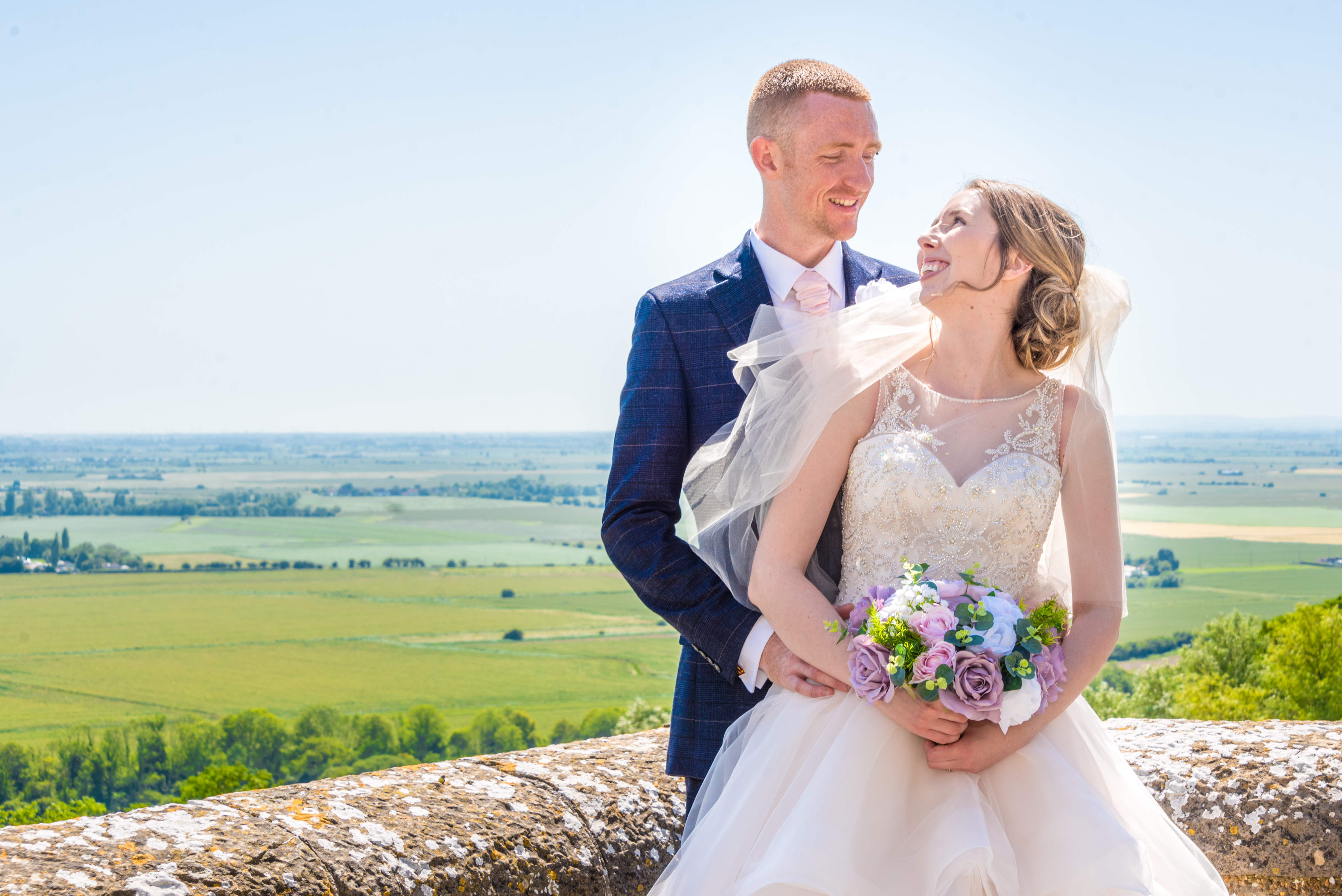 Wedding couple in the grounds at Lympne Castle, Kent