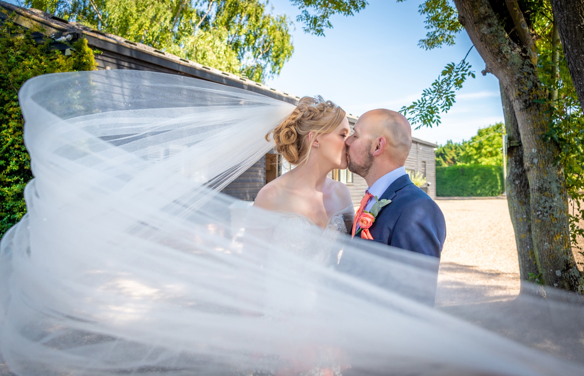 Sweeping veil photo at Winters Barn Wedding Venue in Ashford