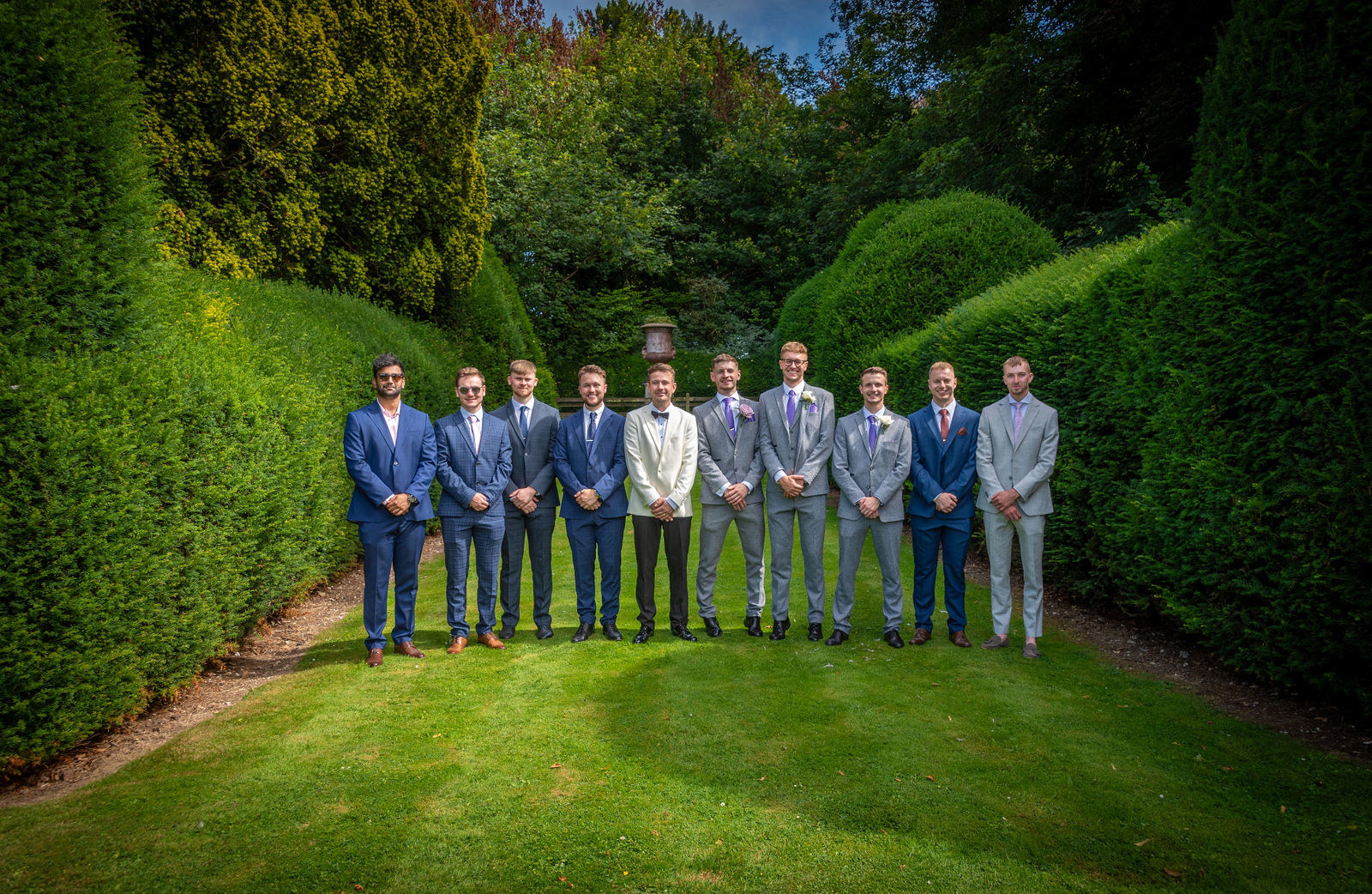 Group photography at Broome Park Hotel wedding venue