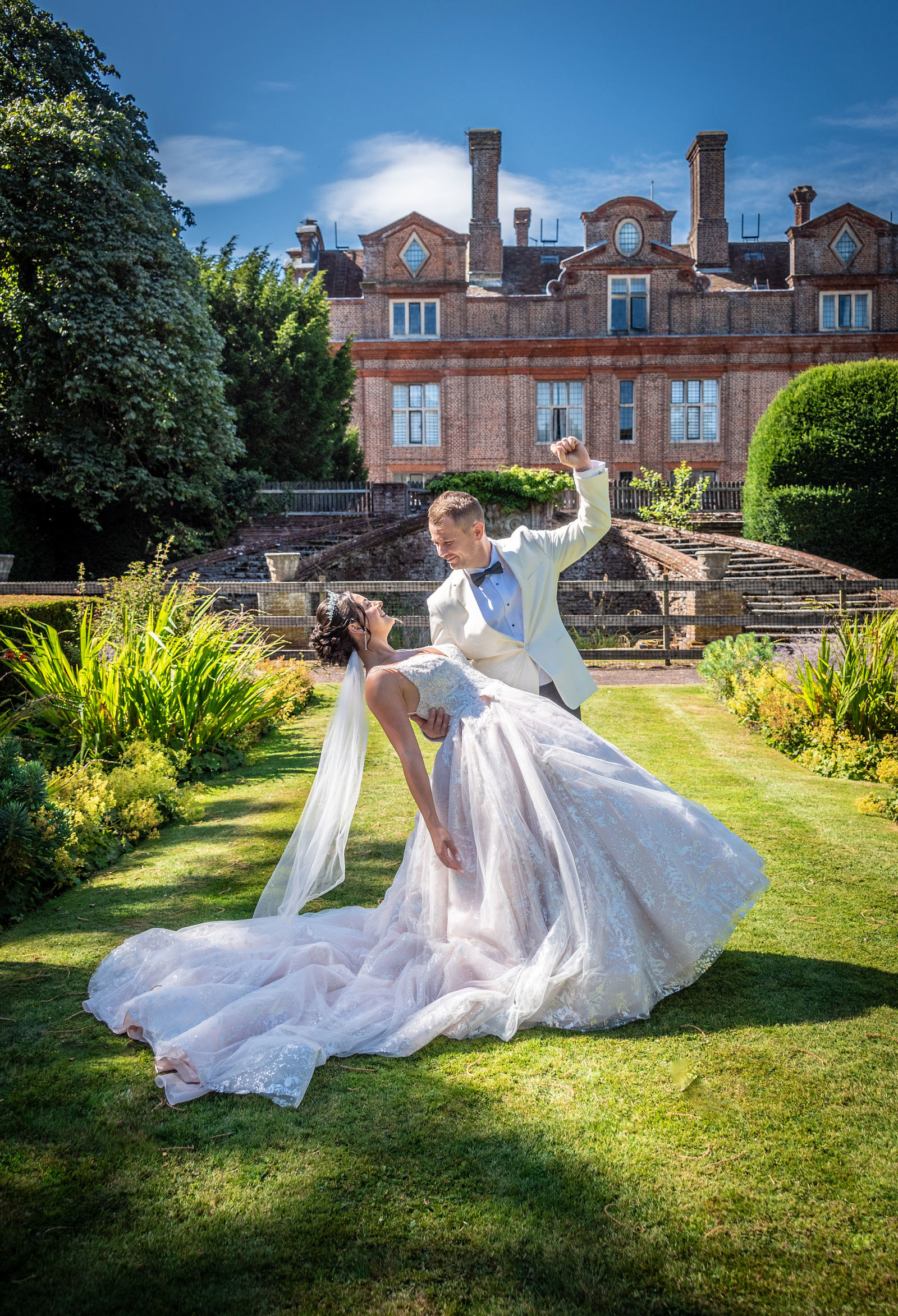 Fun couples photography at Broome Park Hotel wedding venue