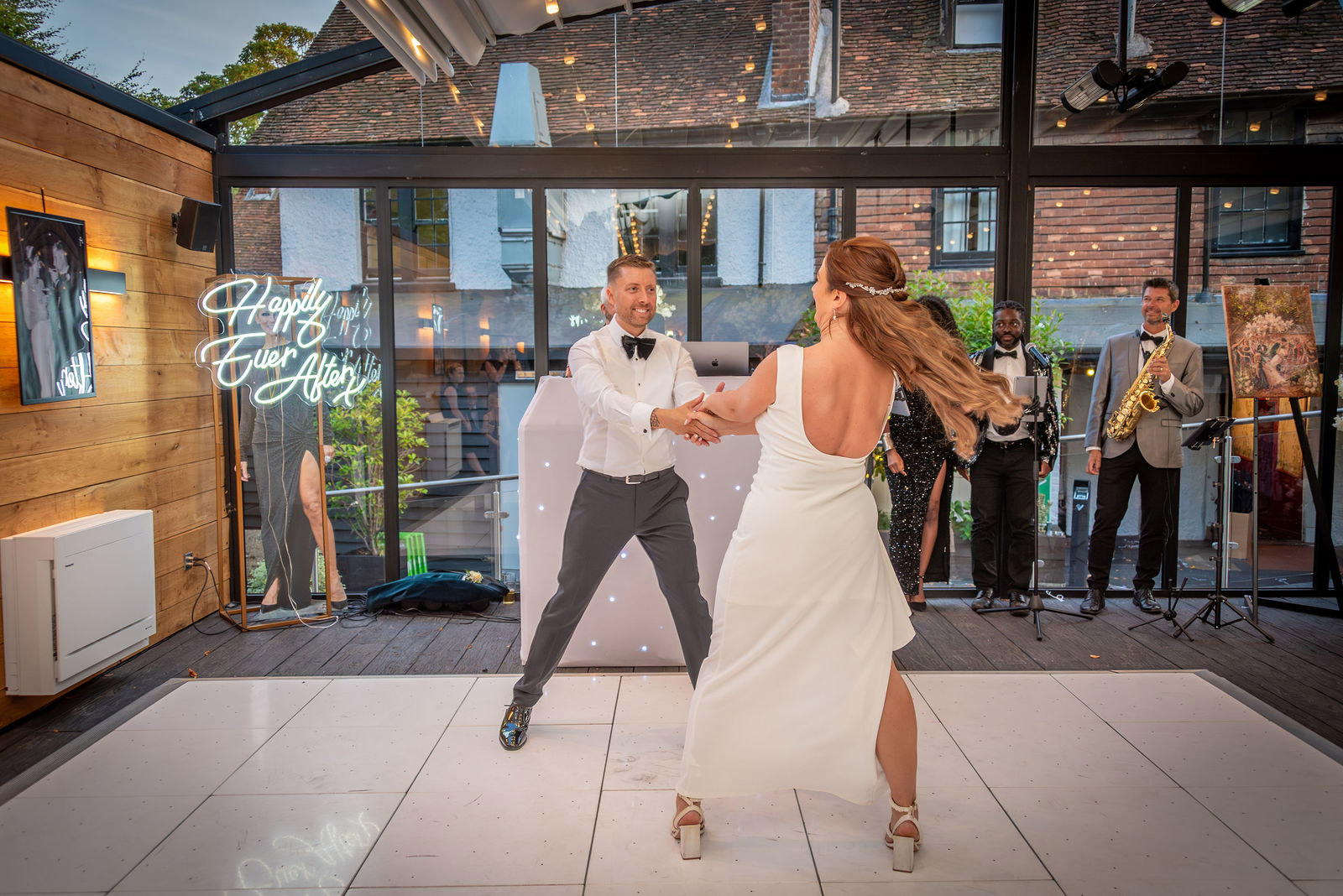 A couple enjoying their first dance at the Buttery and Glasshouse wedding venue in Kent