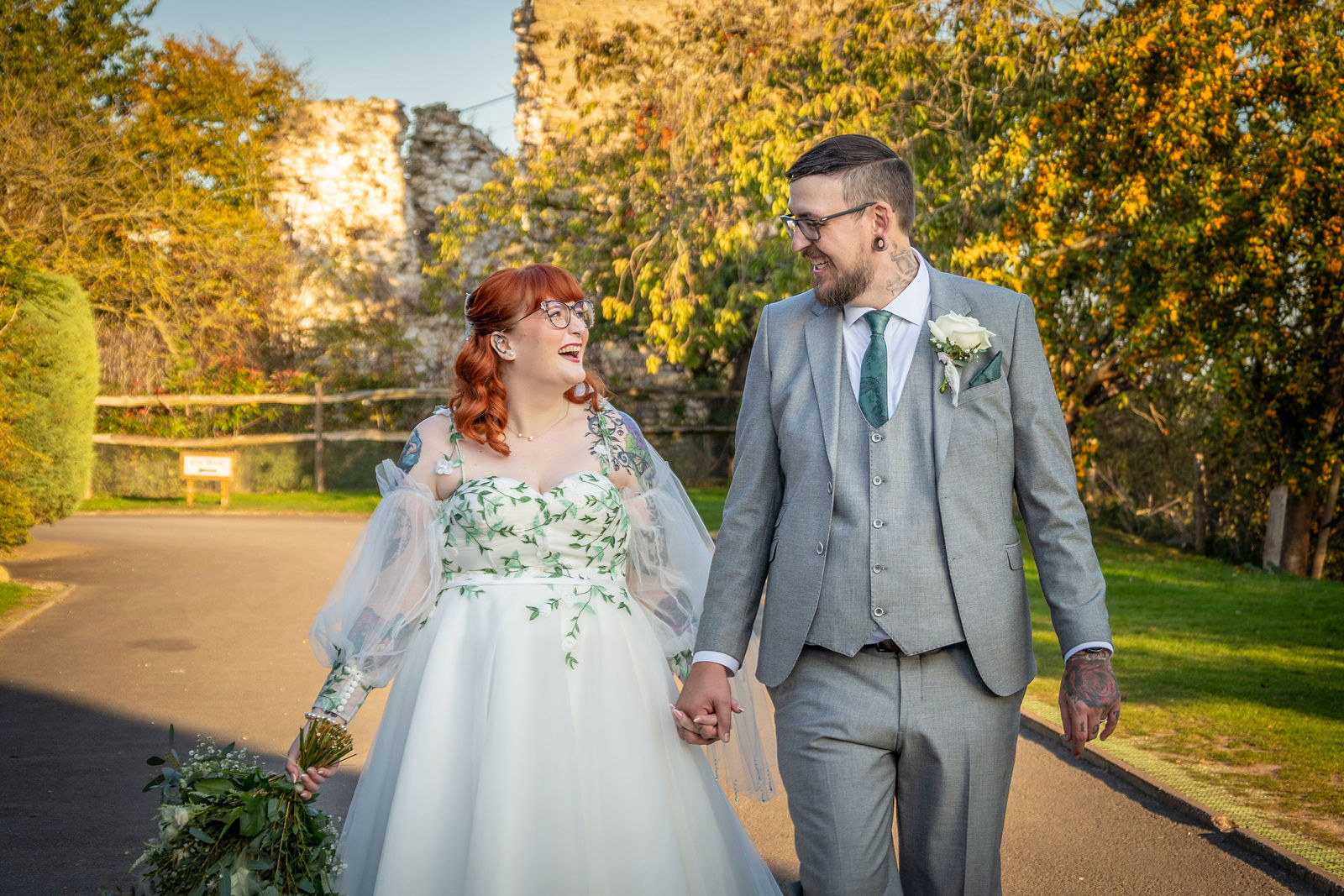 A happy couples photo at Cooling Castle Barn Wedding Venue