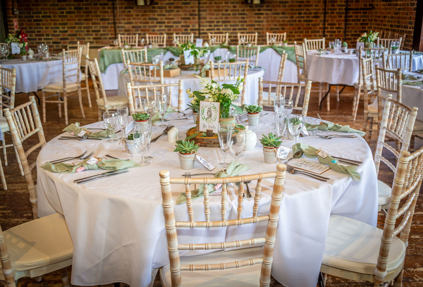 The wedding breakfast setup in the Wagon Store at Kent Life wedding venue
